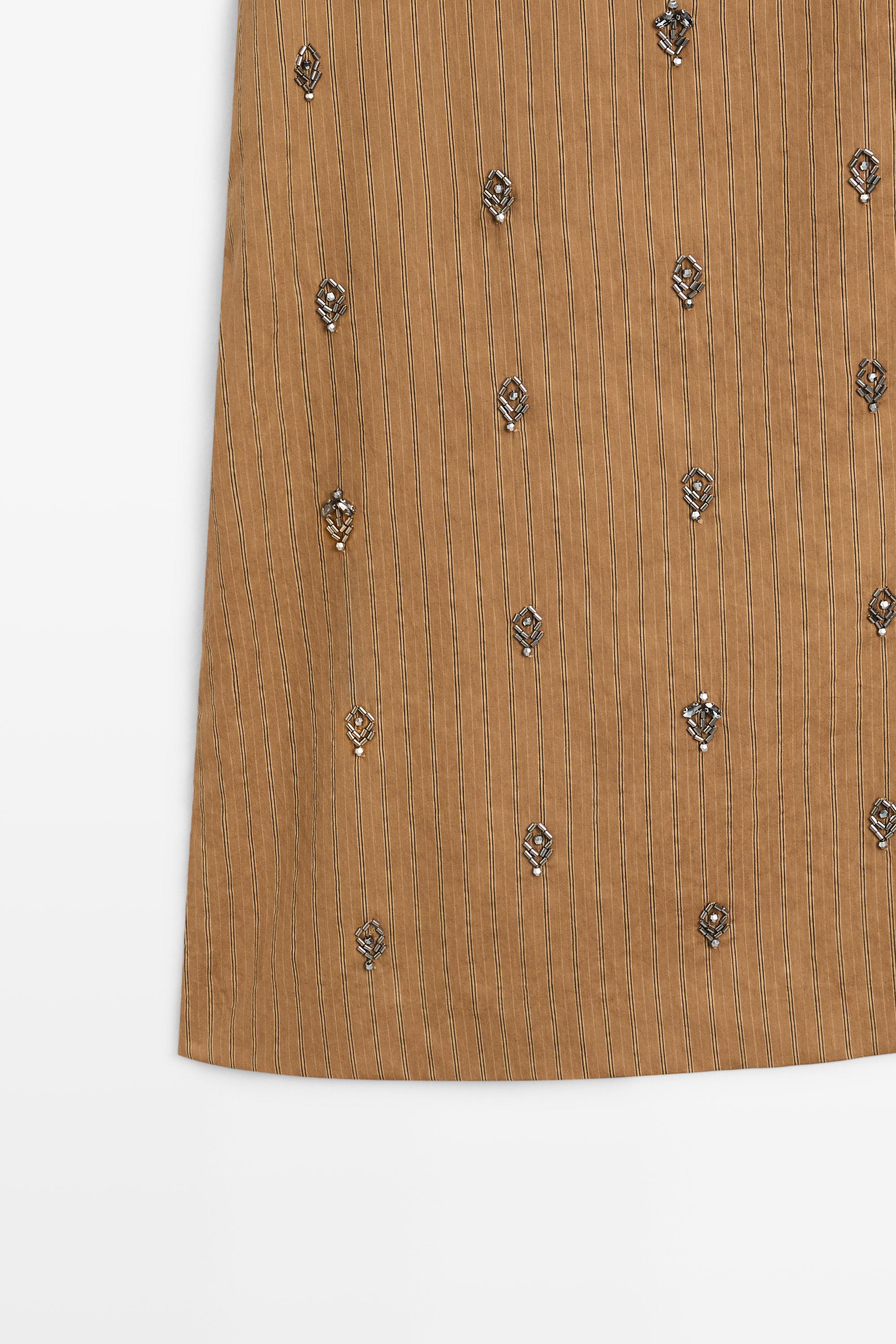 Midi pareo skirt with appliqués